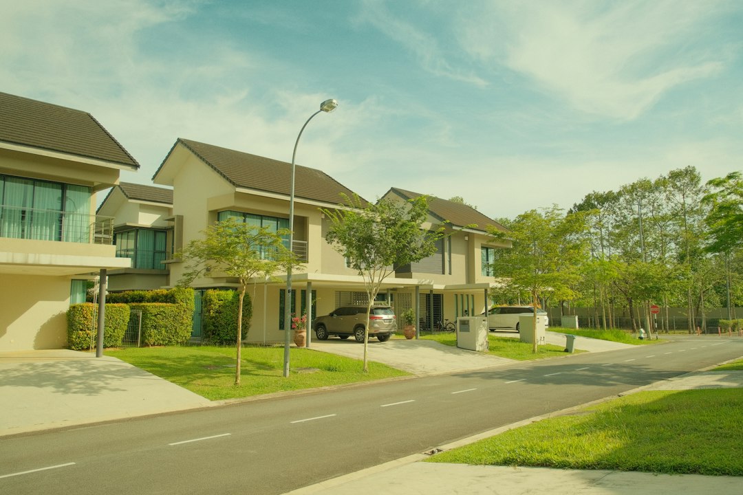 Beautiful, modern suburban home with a well-kept lawn under a bright, sunny sky, representing a desirable Indianapolis pro...